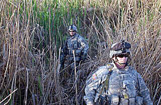 CSM Clyde Glenn (front) and SSG Laurencio Lopez
